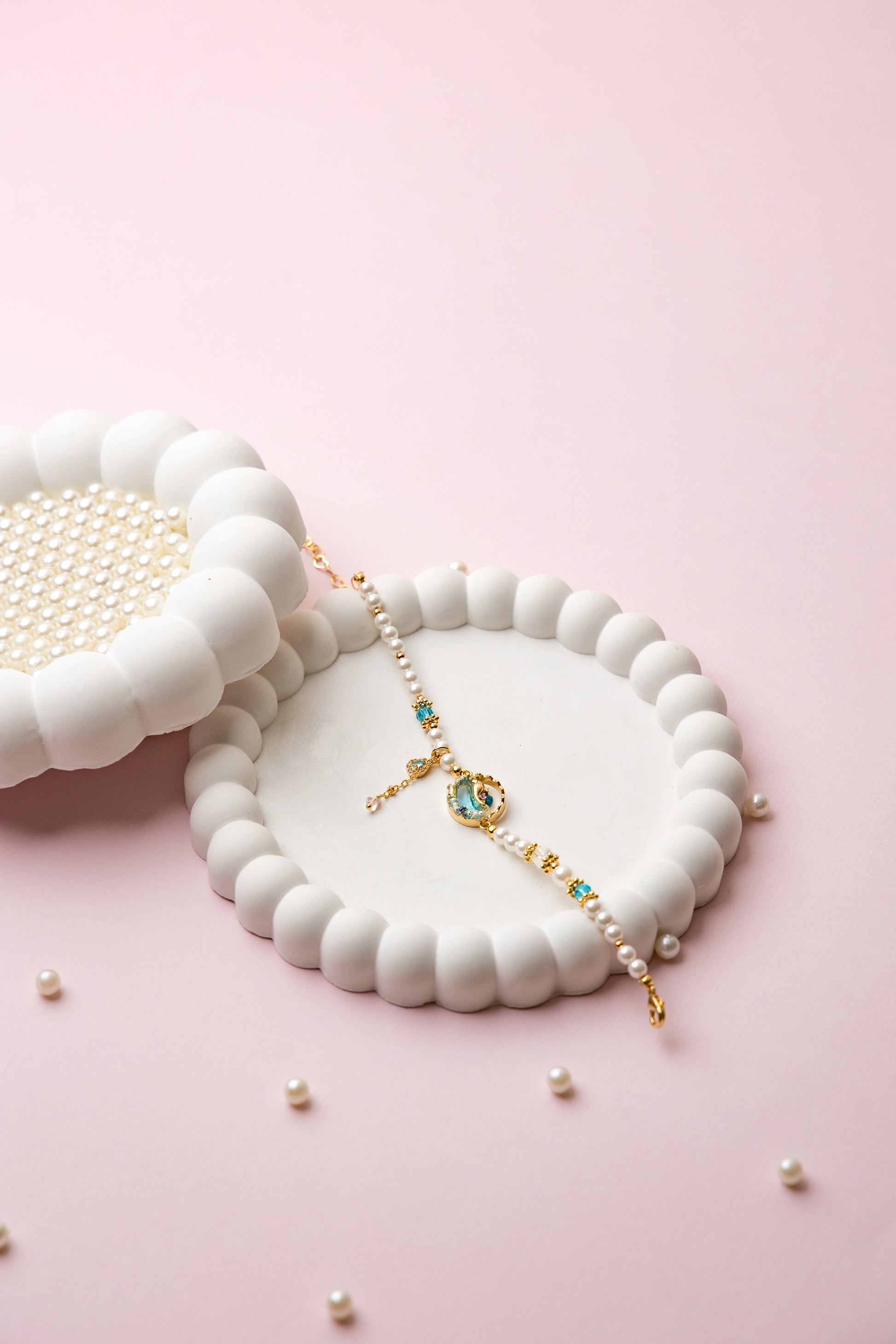 Dive into serenity with the Sea Muse Bracelet, a delicate blend of oceanic elegance and whimsical charm. 