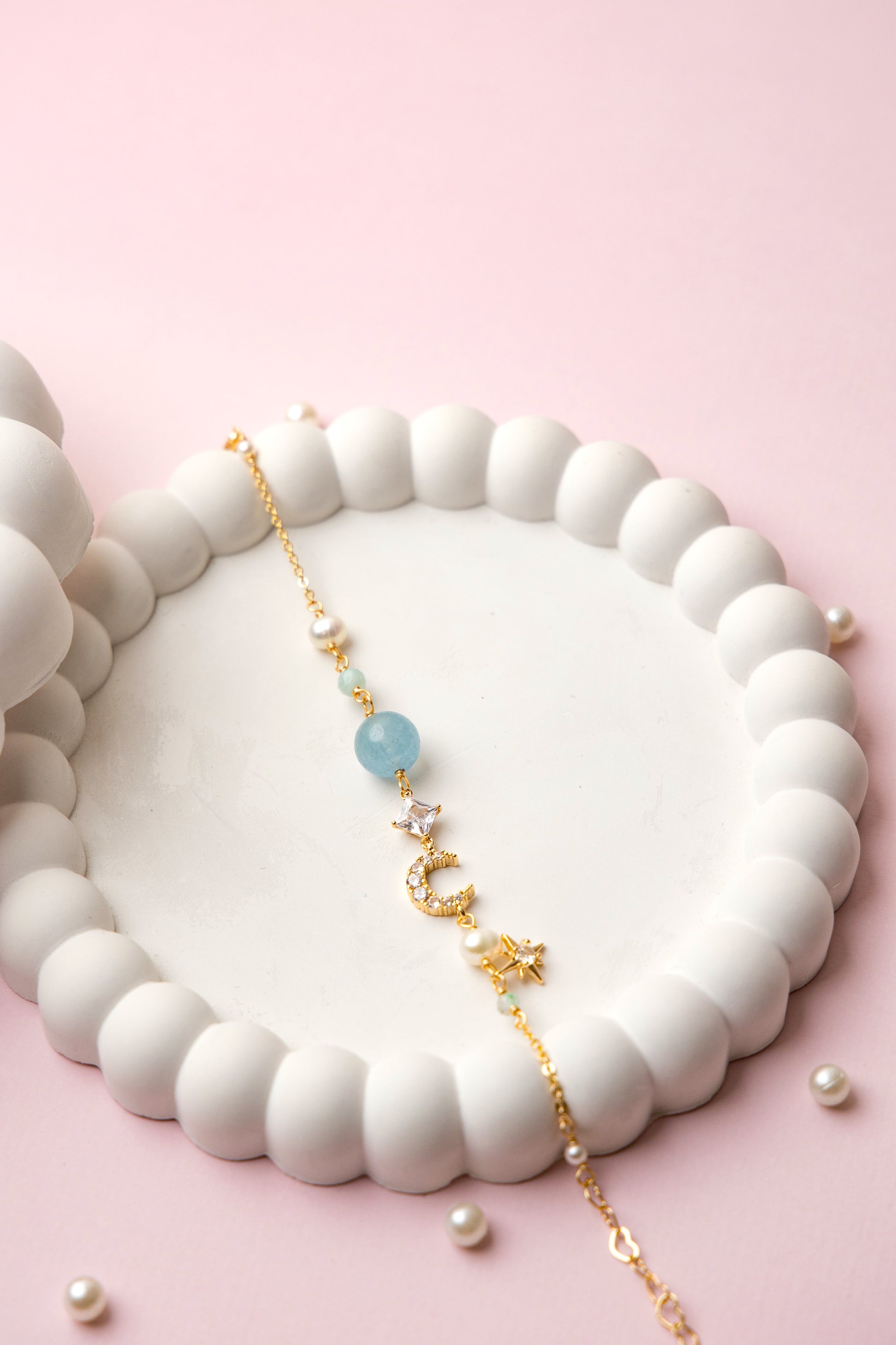 Inspired by the quiet magic of moonlit nights, the Moonlit Muse Bracelet captures the essence of elegance and wonder.