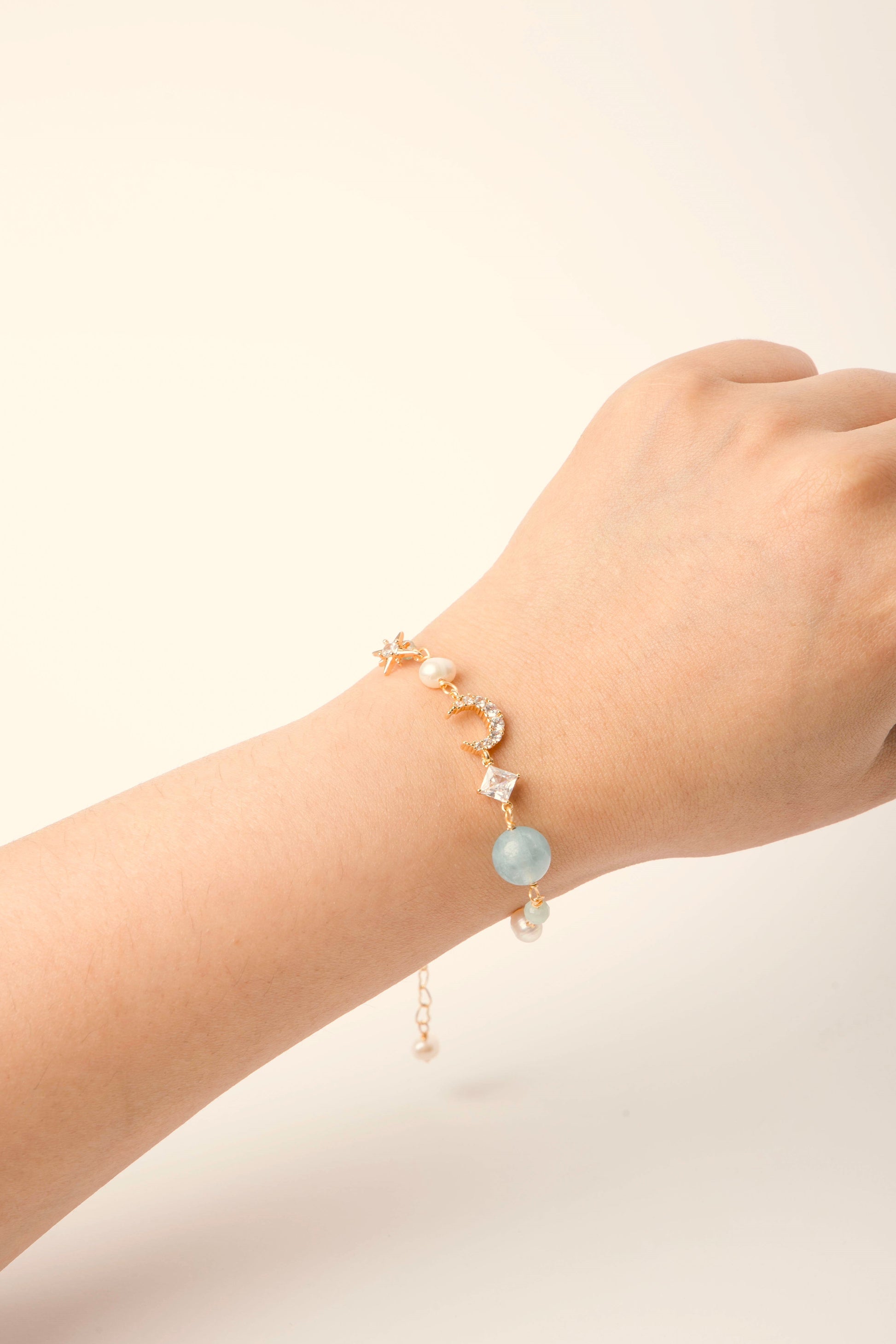 Inspired by the quiet magic of moonlit nights, the Moonlit Muse Bracelet captures the essence of elegance and wonder.