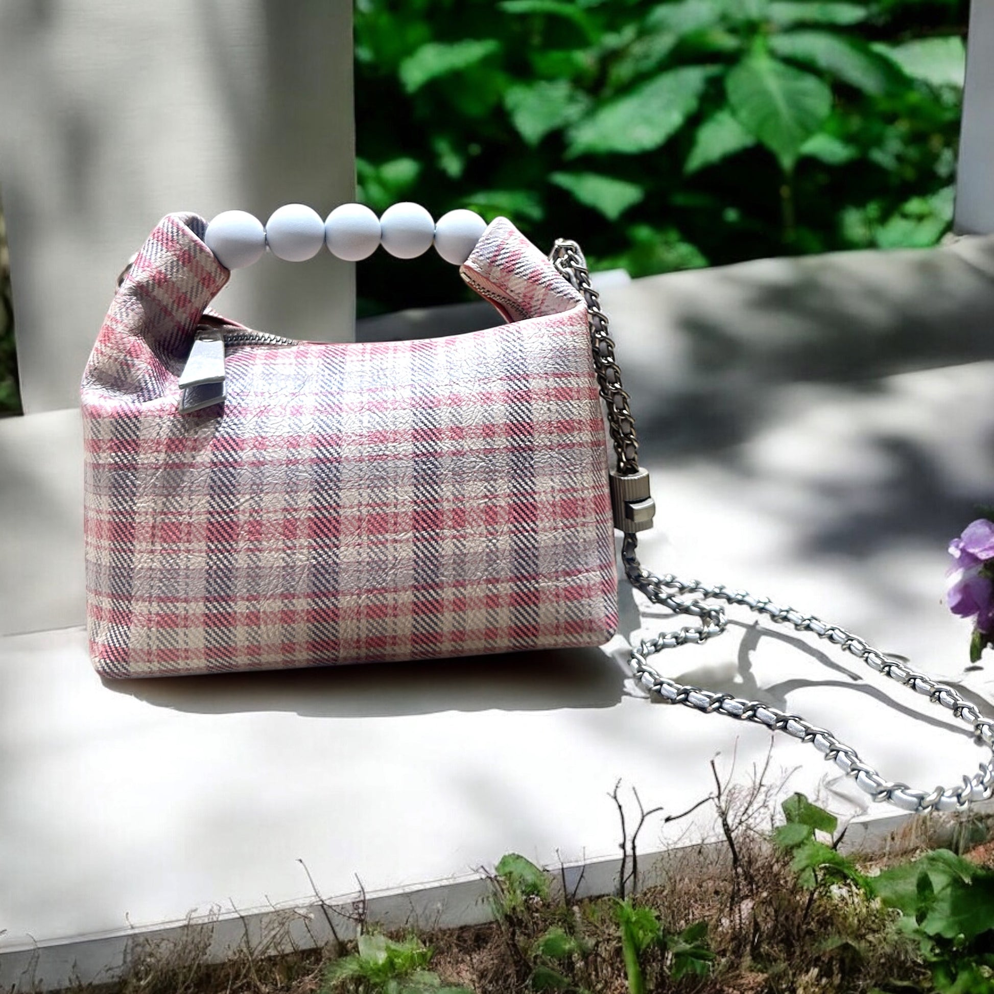 Elevate your style with our trendy collection of bags, featuring woven textures, bold details, and versatile straps.