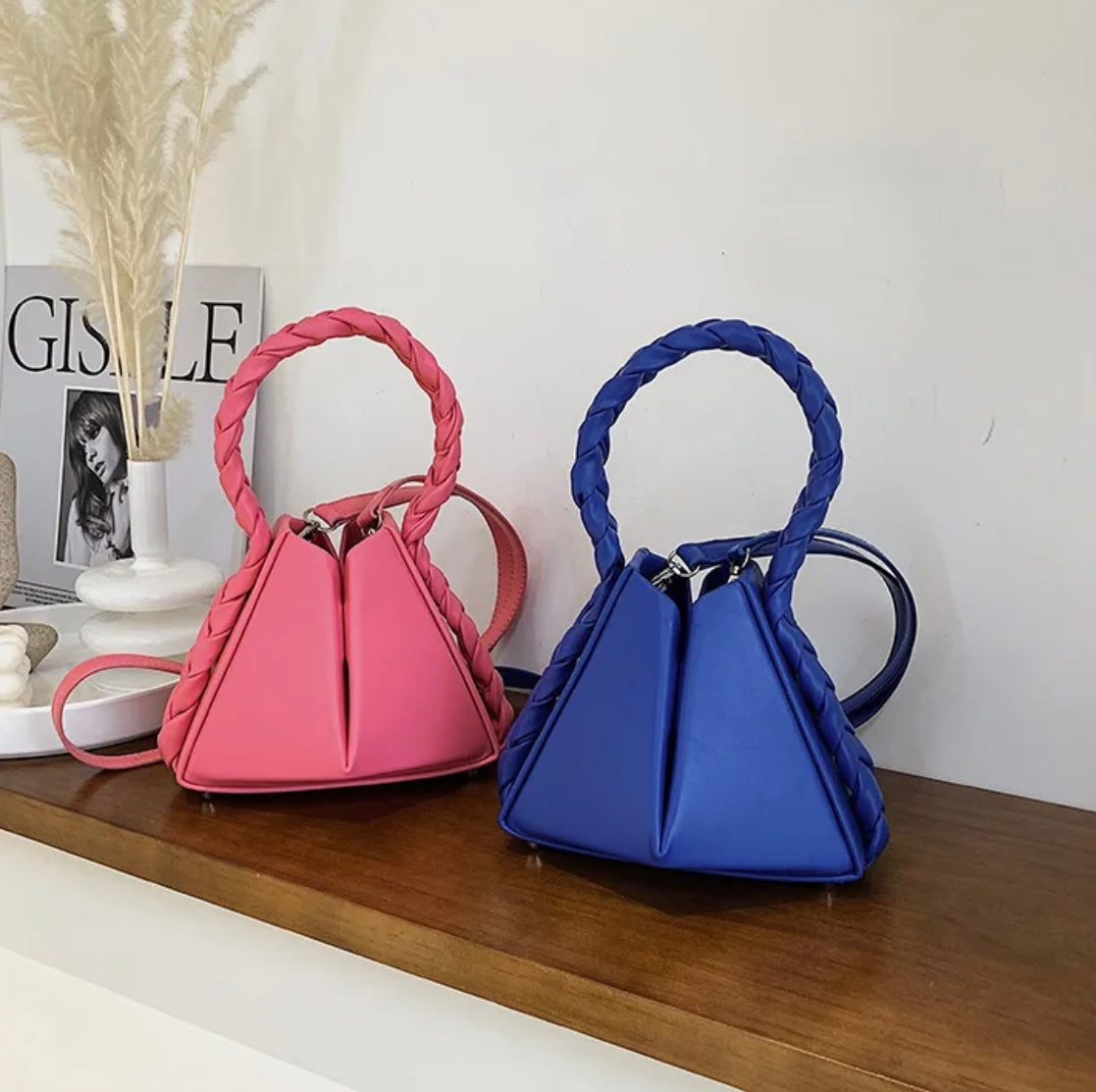 Elevate your style with our trendy collection of bags, featuring woven textures, bold details, and versatile straps. Perfect for adding charm and function to any look.