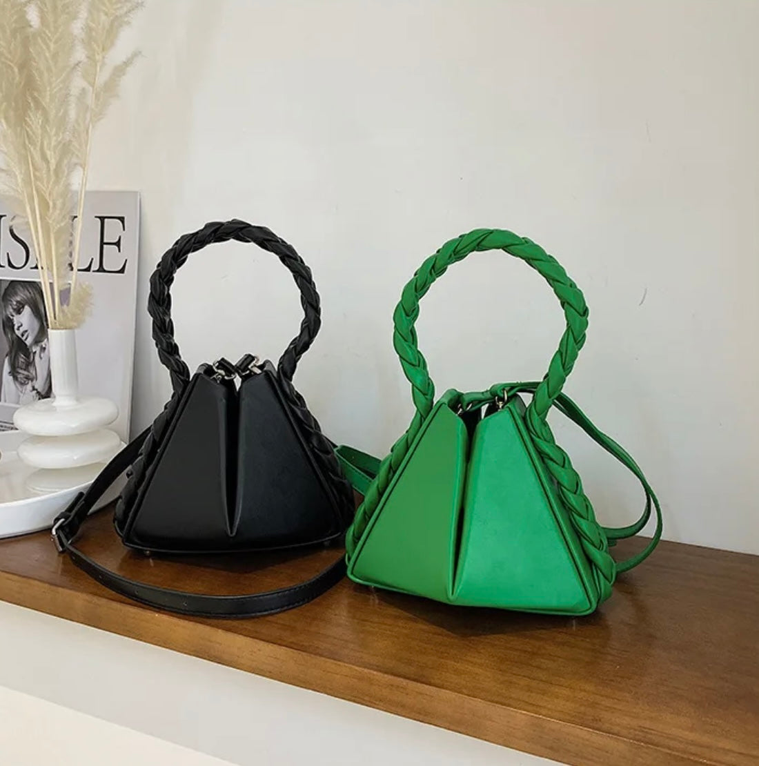 Elevate your style with our trendy collection of bags, featuring woven textures, bold details, and versatile straps. Perfect for adding charm and function to any look.