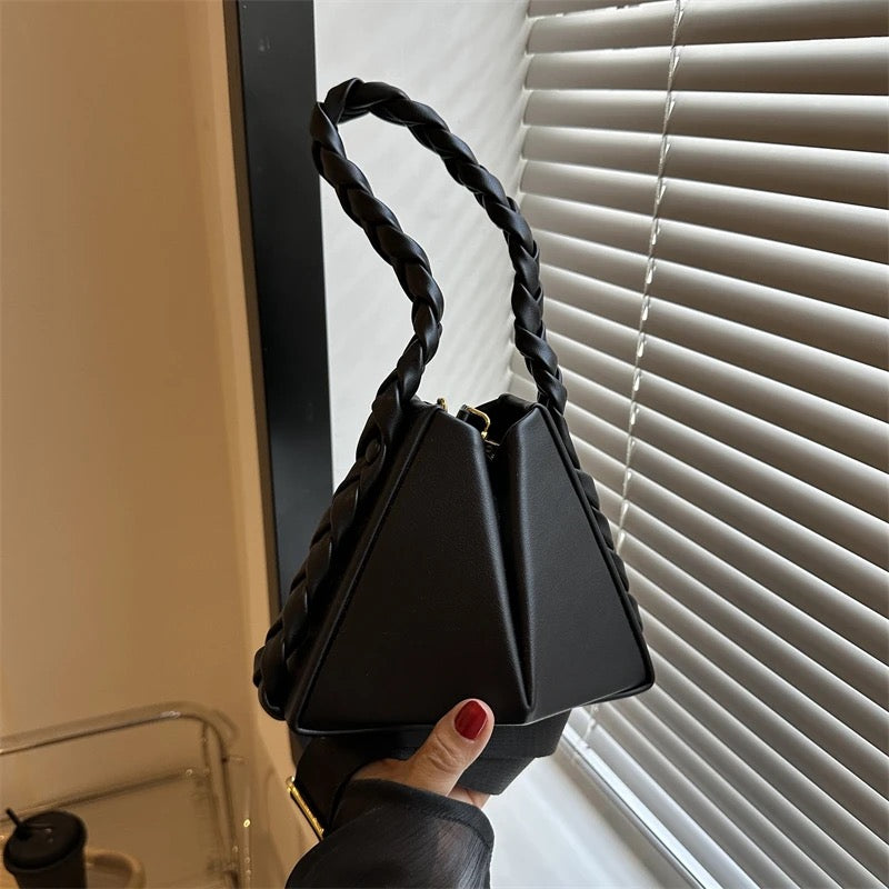 Elevate your style with our trendy collection of bags, featuring woven textures, bold details, and versatile straps. Perfect for adding charm and function to any look.
