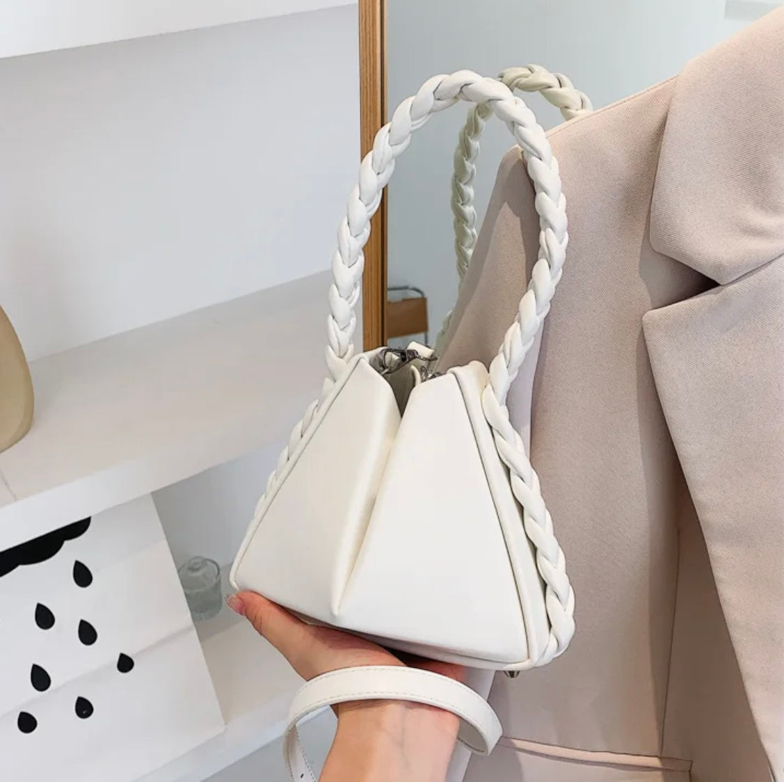 Elevate your style with our trendy collection of bags, featuring woven textures, bold details, and versatile straps. Perfect for adding charm and function to any look.
