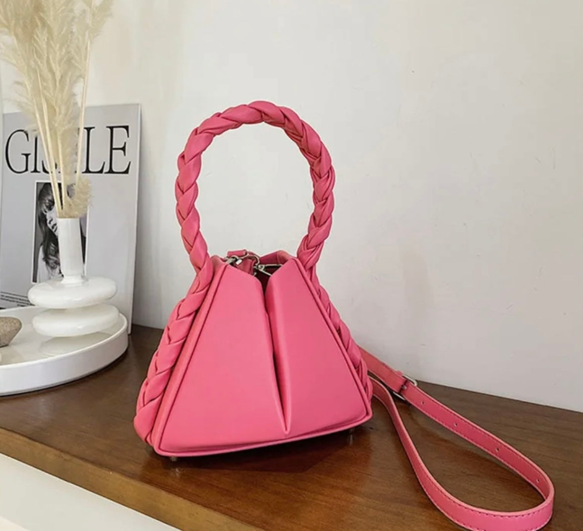 Elevate your style with our trendy collection of bags, featuring woven textures, bold details, and versatile straps. Perfect for adding charm and function to any look.