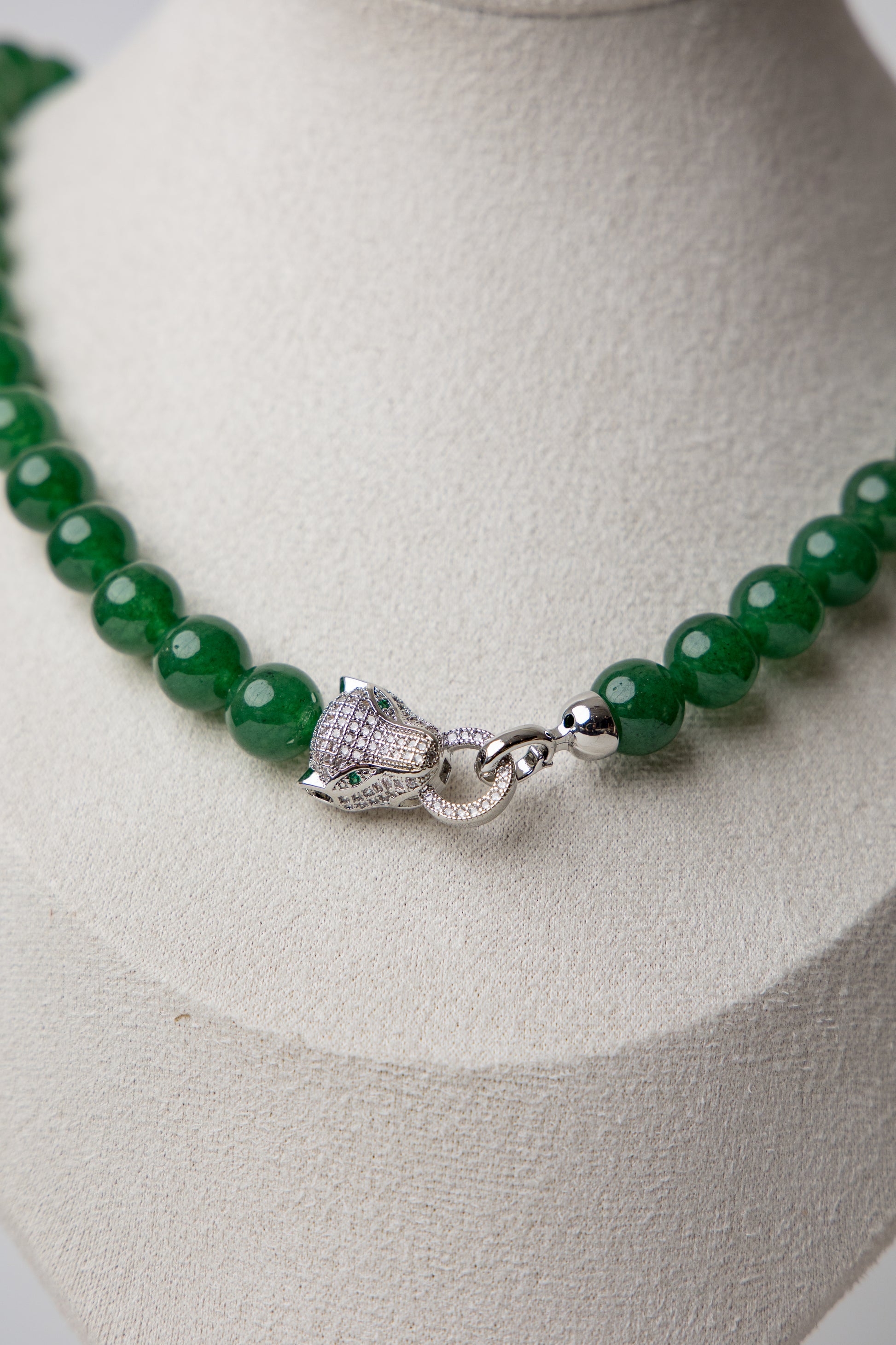 Make a fierce statement with bold jade beads and a panther clasp that exudes strength. An elevated piece with untamed energy