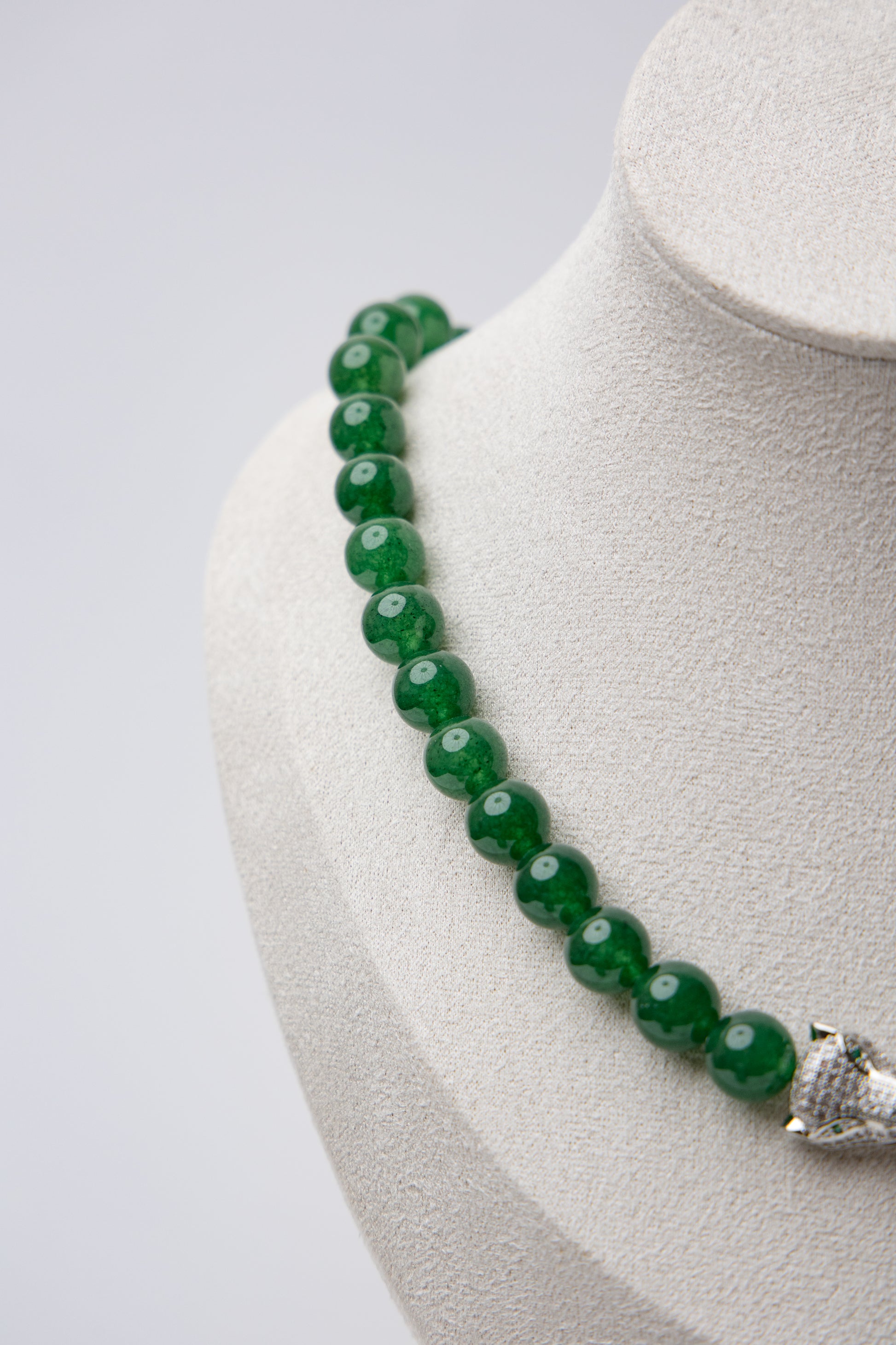 Make a fierce statement with bold jade beads and a panther clasp that exudes strength. An elevated piece with untamed energy
