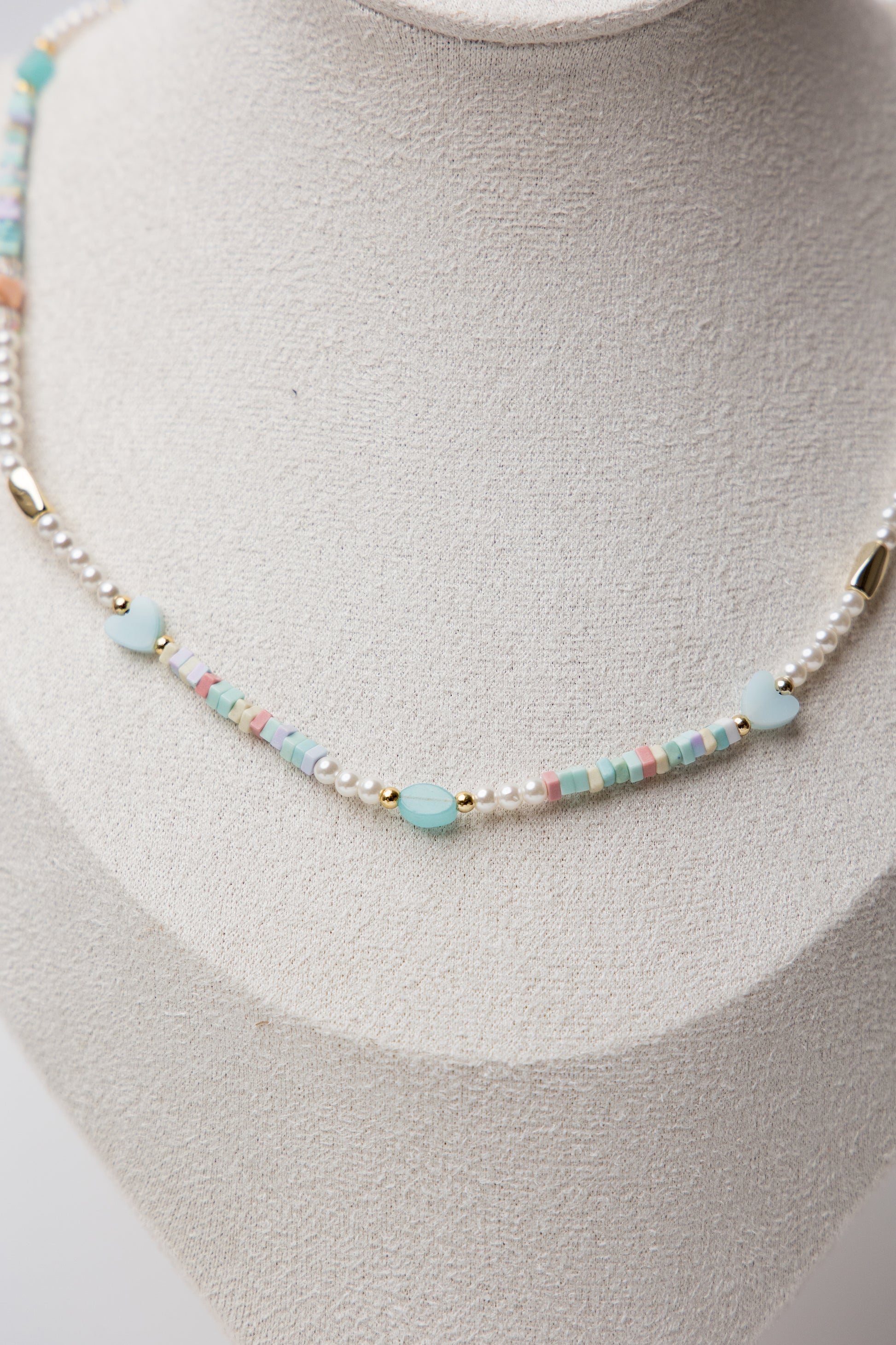 Pearl Glow Beaded Necklace in Ocean Blue featuring a calming blend of cool-toned blue beads and lustrous pearls, styled for an elegant yet playful look.