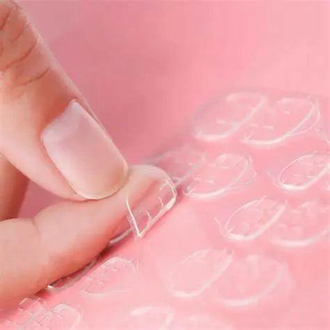 One Sheet Of 24 Nails Glue Tabs each