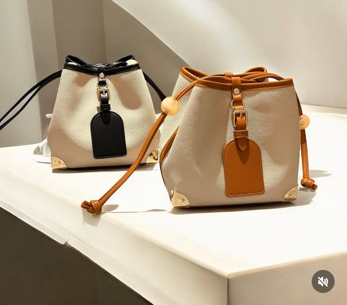 Elevate your style with our trendy collection of bags, featuring woven textures, bold details, and versatile straps.