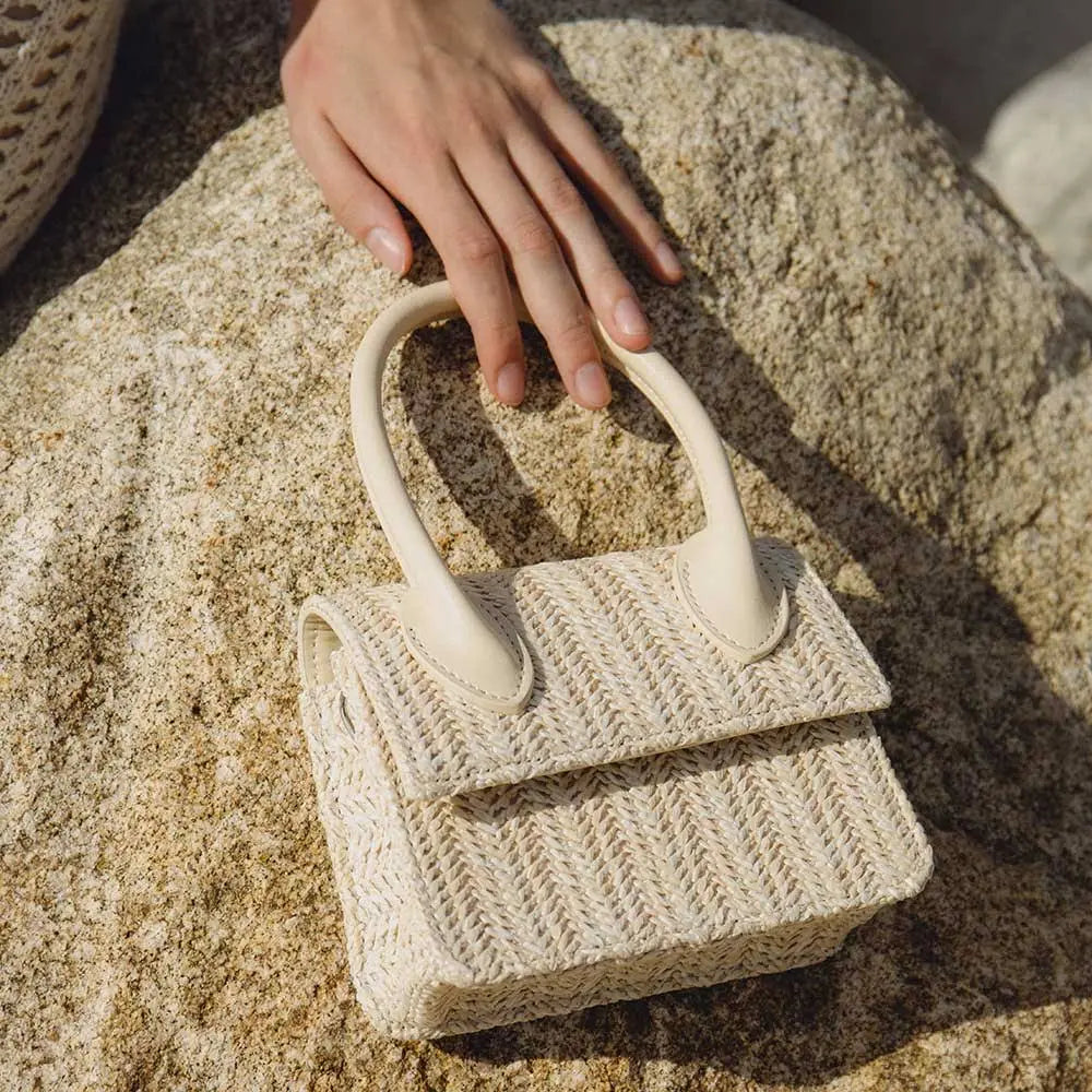 Elevate your style with our trendy collection of bags, featuring woven textures, bold details, and versatile straps. Perfect for adding charm and function to any look.