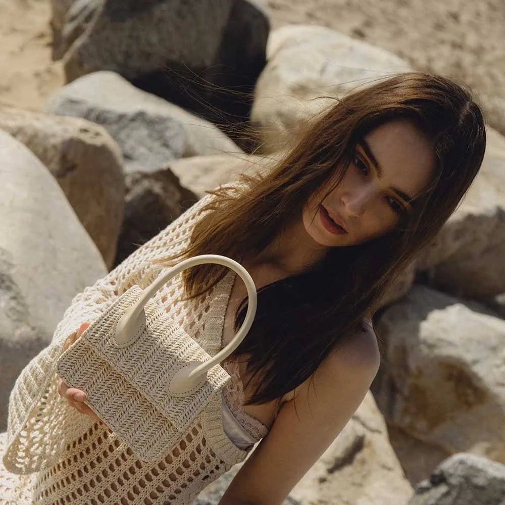 Elevate your style with our trendy collection of bags, featuring woven textures, bold details, and versatile straps. Perfect for adding charm and function to any look.