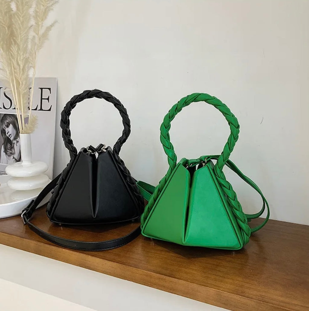 Elevate your style with our trendy collection of bags, featuring woven textures, bold details, and versatile straps. Perfect for adding charm and function to any look.