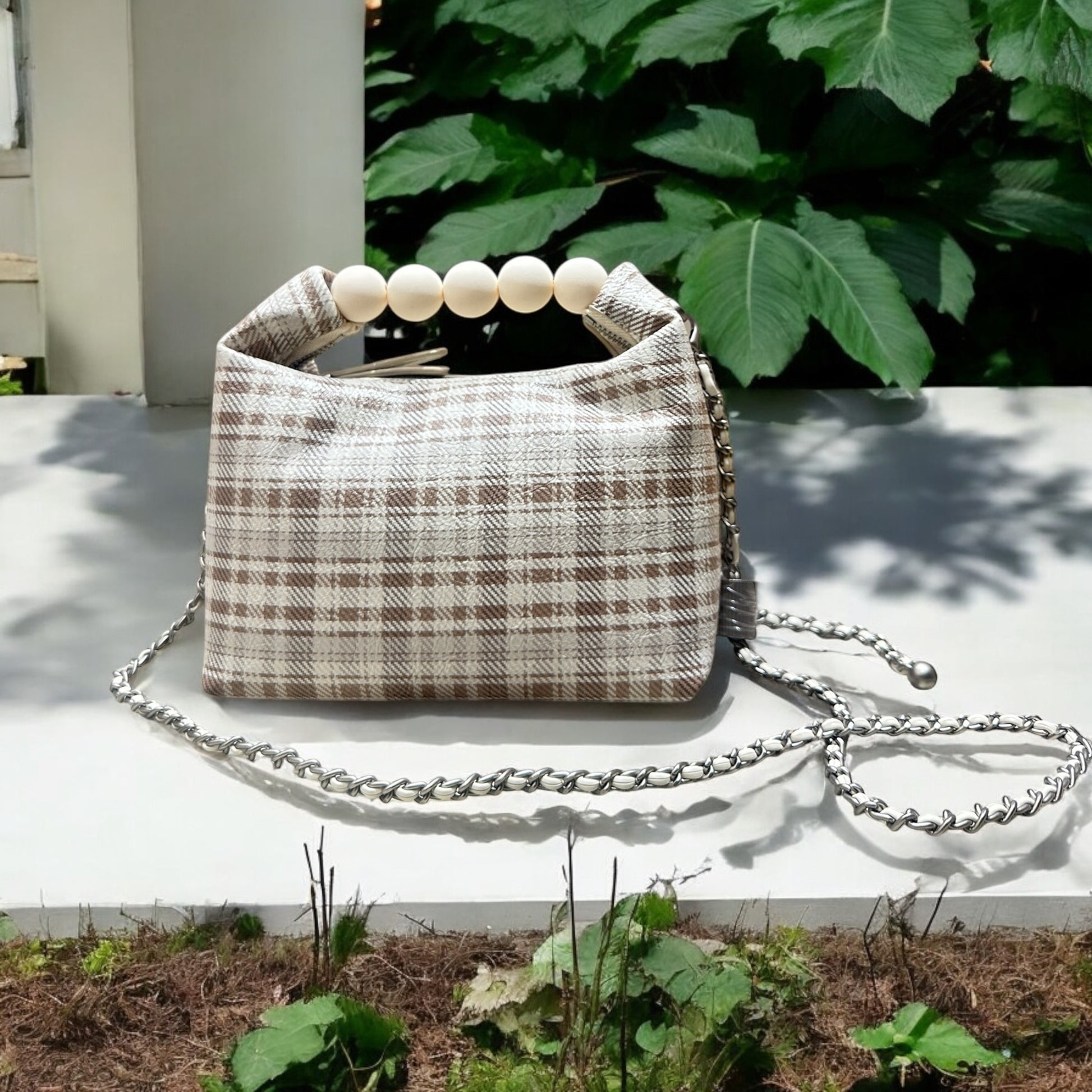 Elevate your style with our trendy collection of bags, featuring woven textures, bold details, and versatile straps.